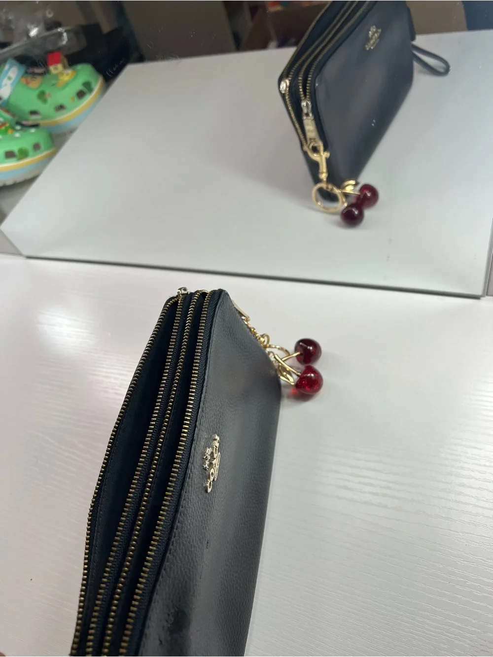 Coach Black Leather Wristlet Wallet with Cherry Charm